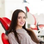 young woman in dental chair