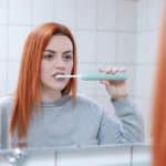 girl brushing teeth